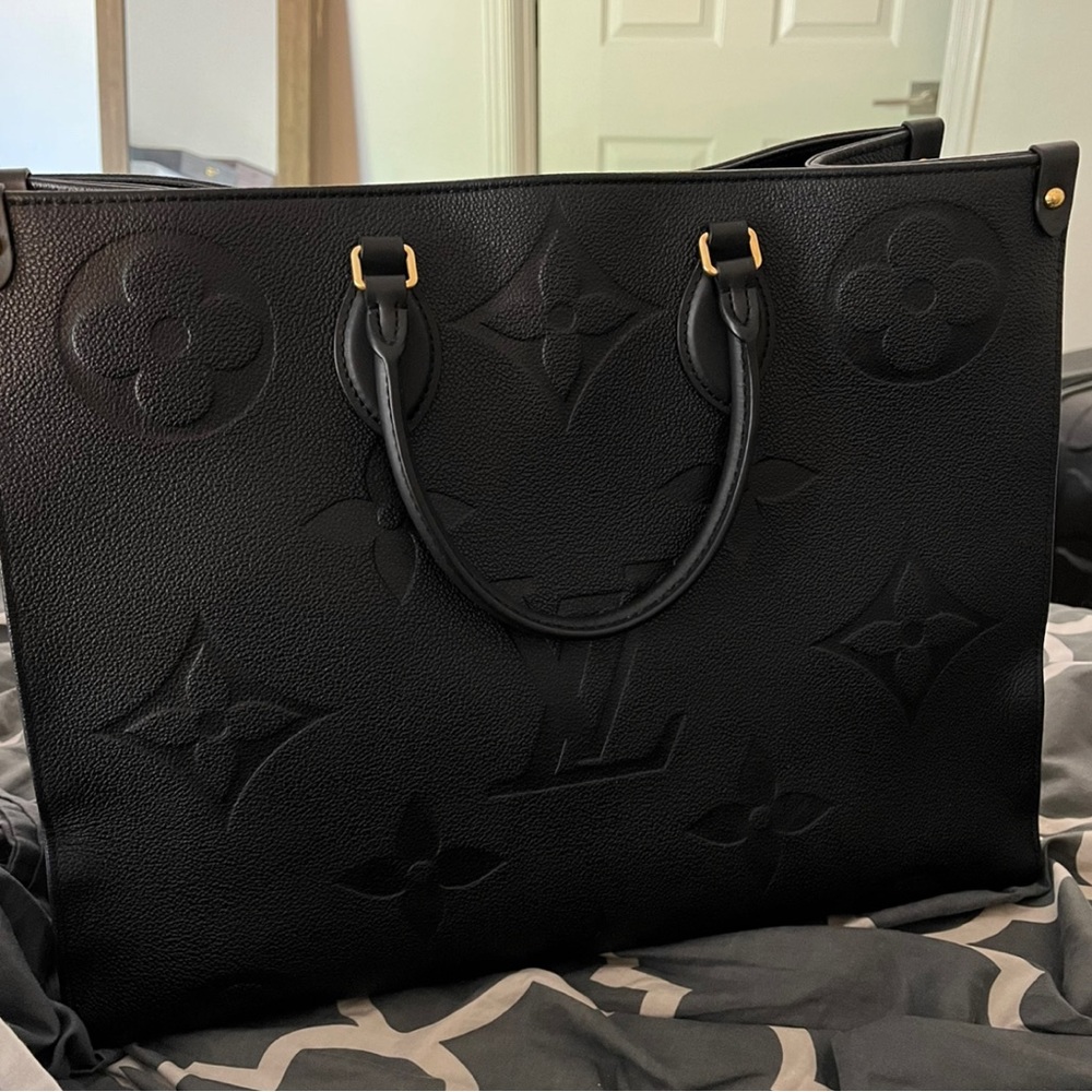 Louis Vuitton ON THE GO GM empreinte leather